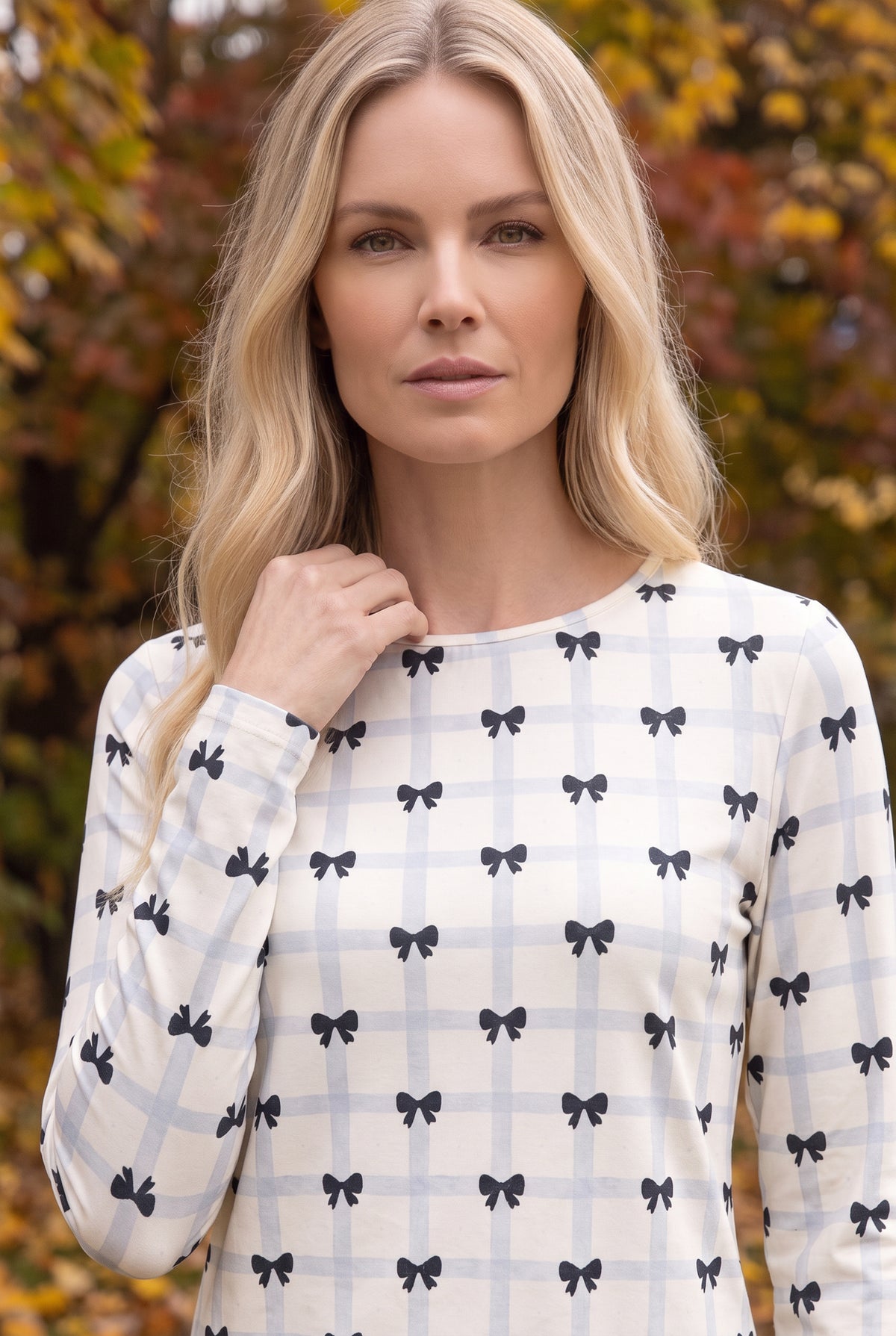 Model wearing Nuggles®  Long Sleeve Essential Tee in  Bow Check