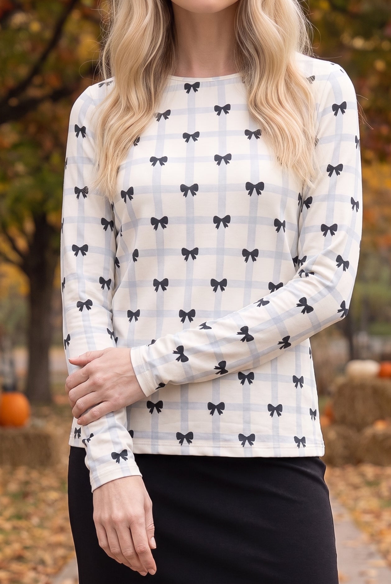 Model wearing Nuggles®  Long Sleeve Essential Tee in  Bow Check