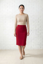 Model wearing Nuggles® 25" Relaxed Midi Skirt in Brick Red
