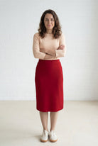 Model wearing Nuggles® 27" Relaxed Midi Skirt in Brick Red