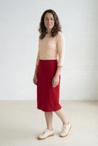 Model wearing Nuggles® 27" Relaxed Midi Skirt in Brick Red