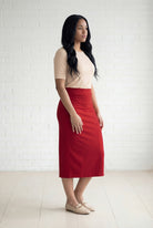 Model wearing Nuggles® 31" Relaxed Midi Skirt in Brick Red