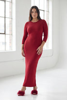 Model wearing Nuggles® Maxi Layering Dress in Brick Red