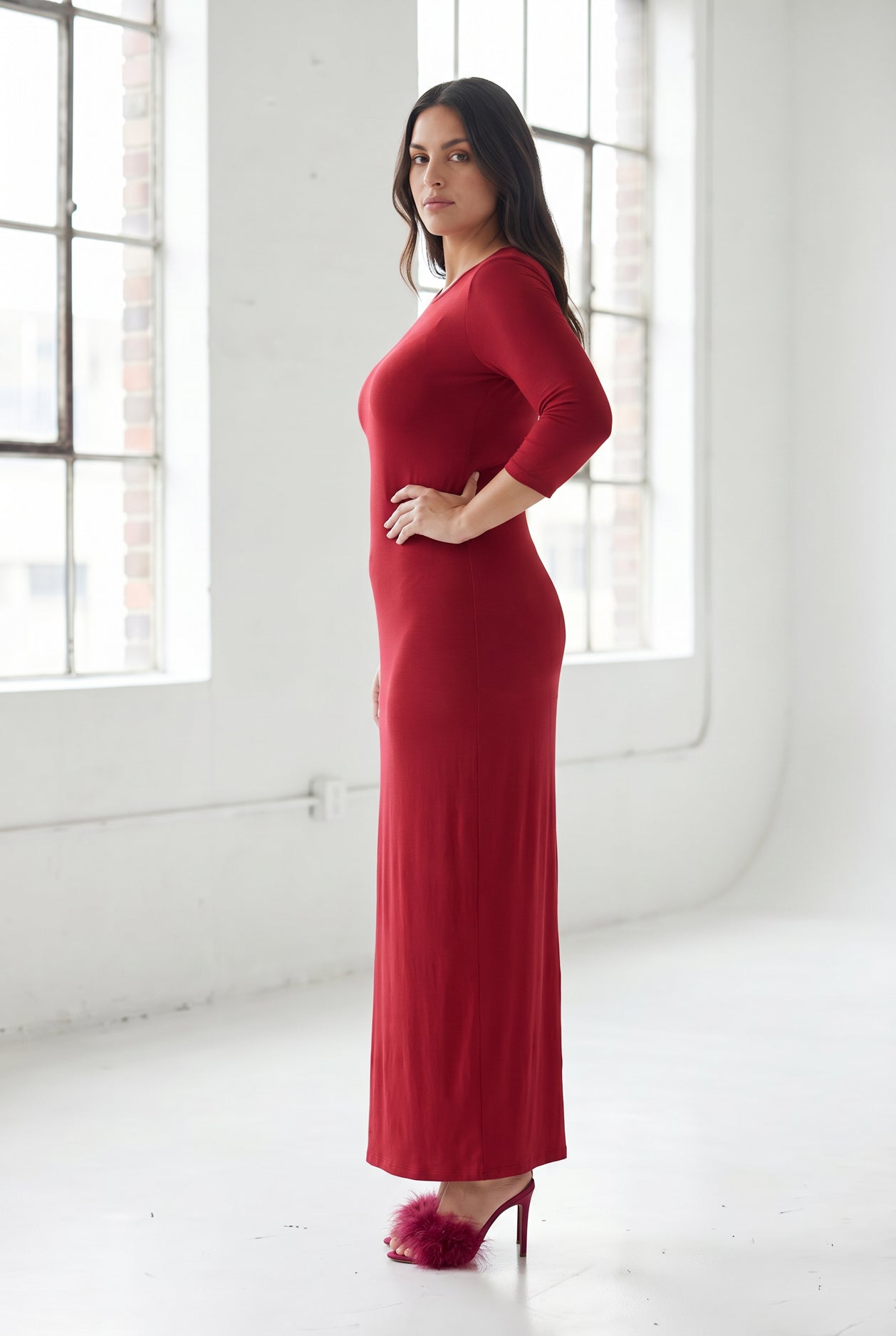 Model wearing Nuggles® Maxi Layering Dress in Brick Red