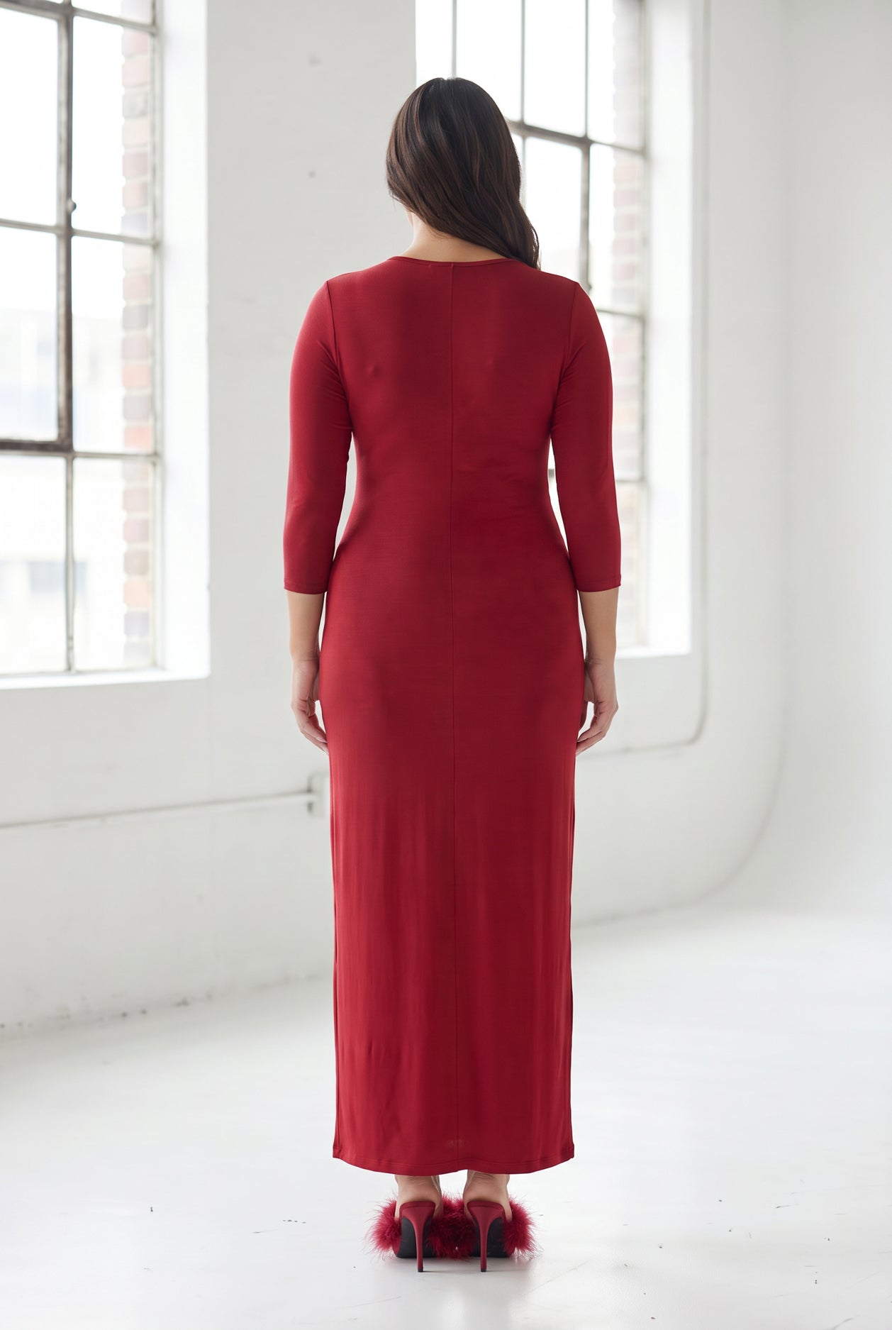 Model wearing Nuggles® Maxi Layering Dress in Brick Red