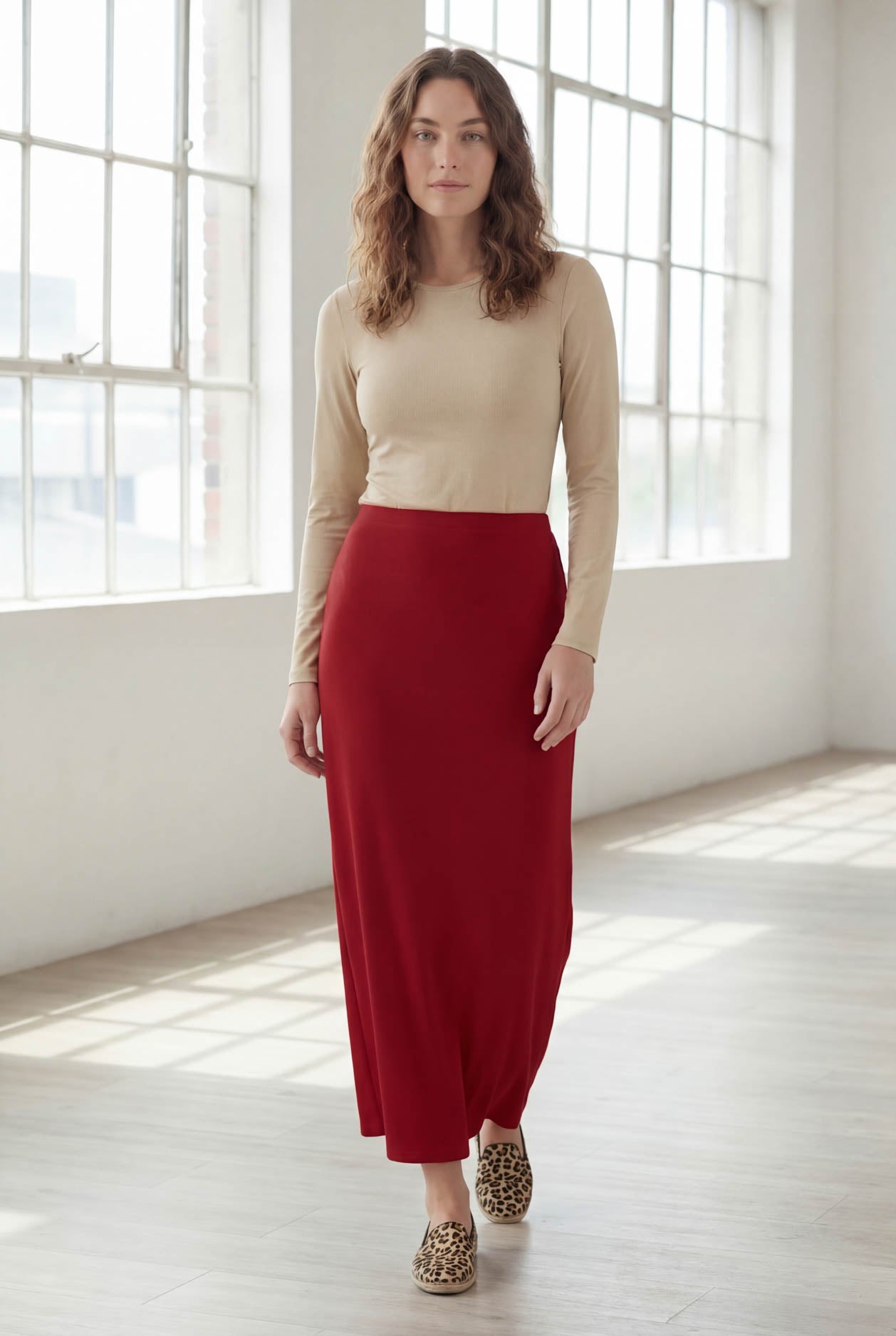 Model wearing Nuggles® 36" Classic Skirt  in Brick Red