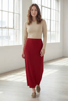 Model wearing Nuggles® 36" Classic Skirt  in Brick Red