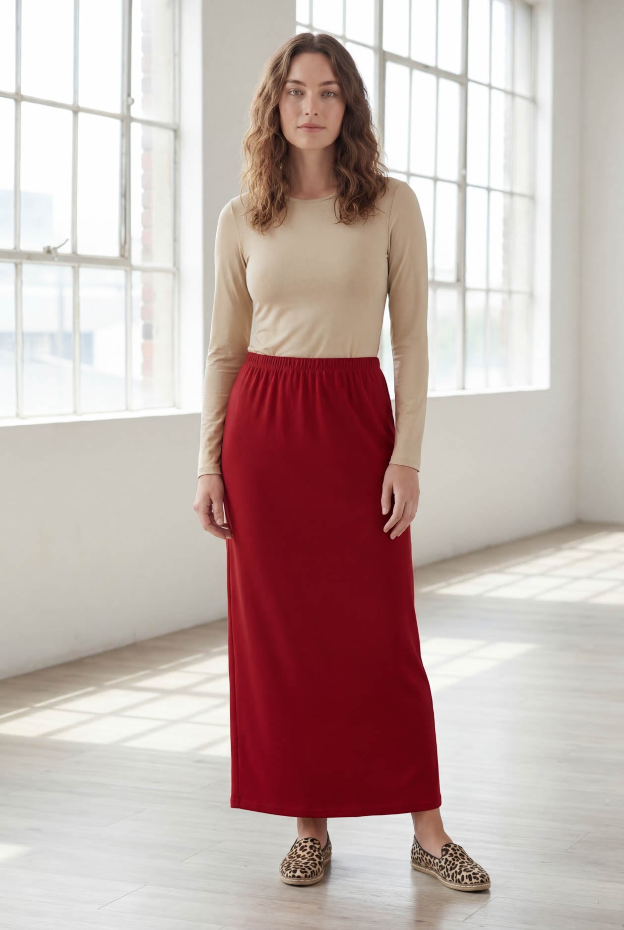 Model wearing Nuggles® 36" Classic Skirt  in Brick Red