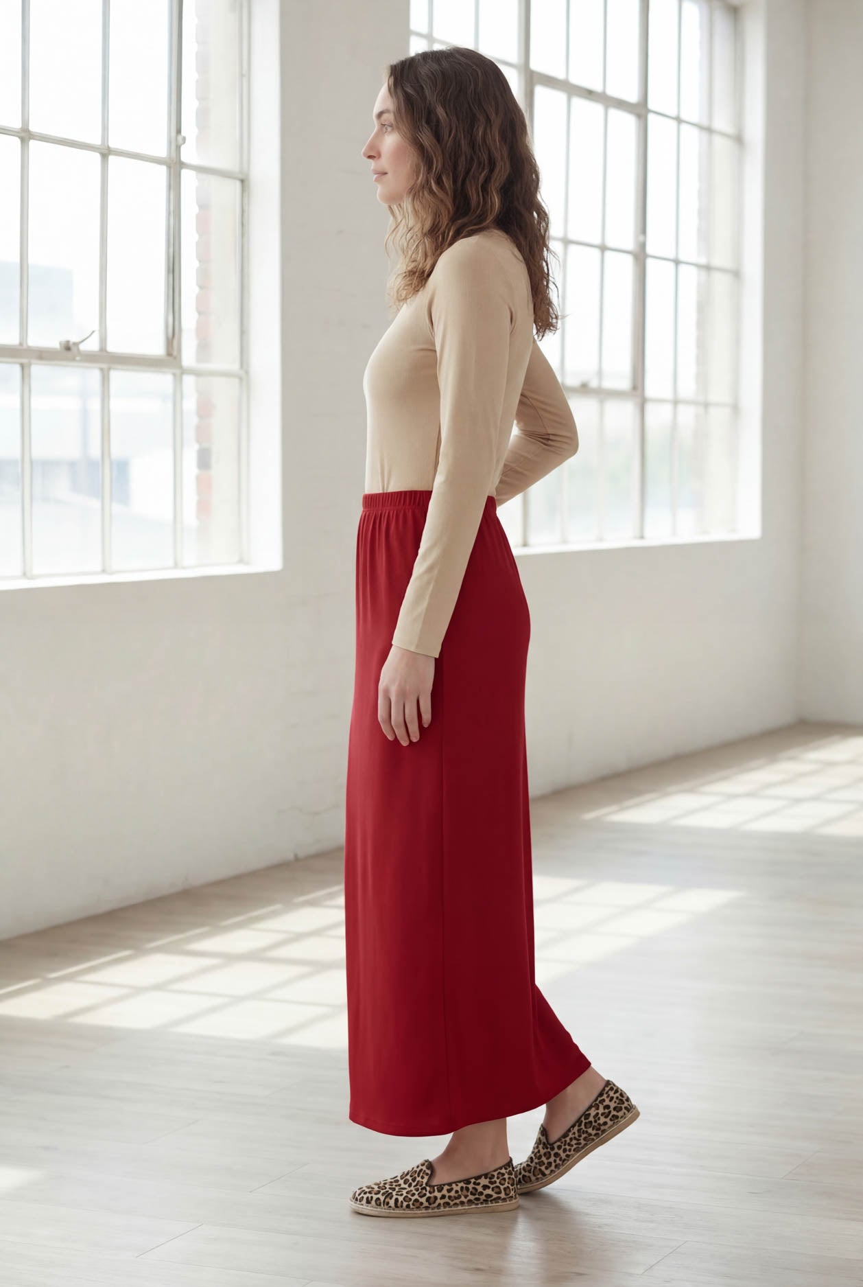Model wearing Nuggles® 36" Classic Skirt  in Brick Red