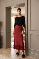Model wearing Nuggles®  Callie Skirt in Brick Red
