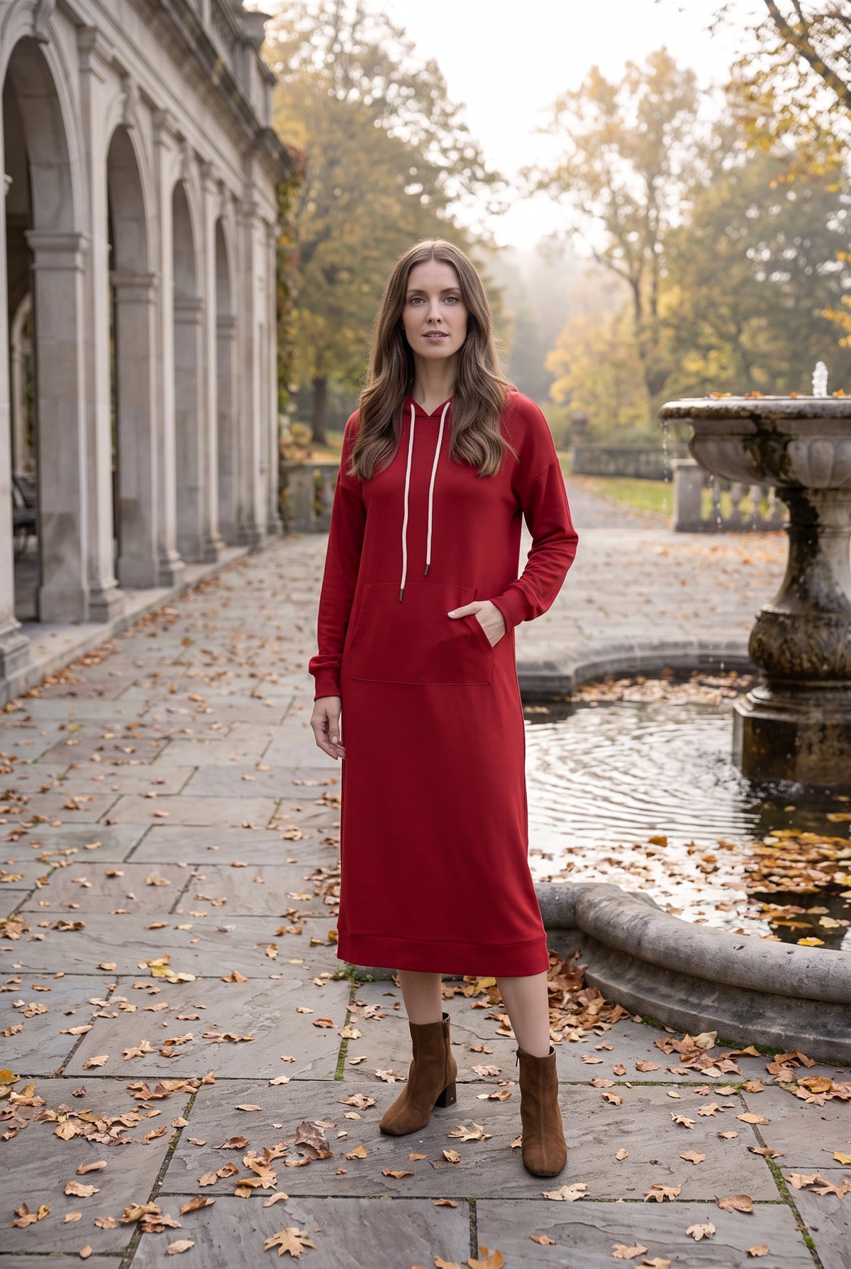 Model wearing Nuggles®   Hoodie Dress in Brick Red