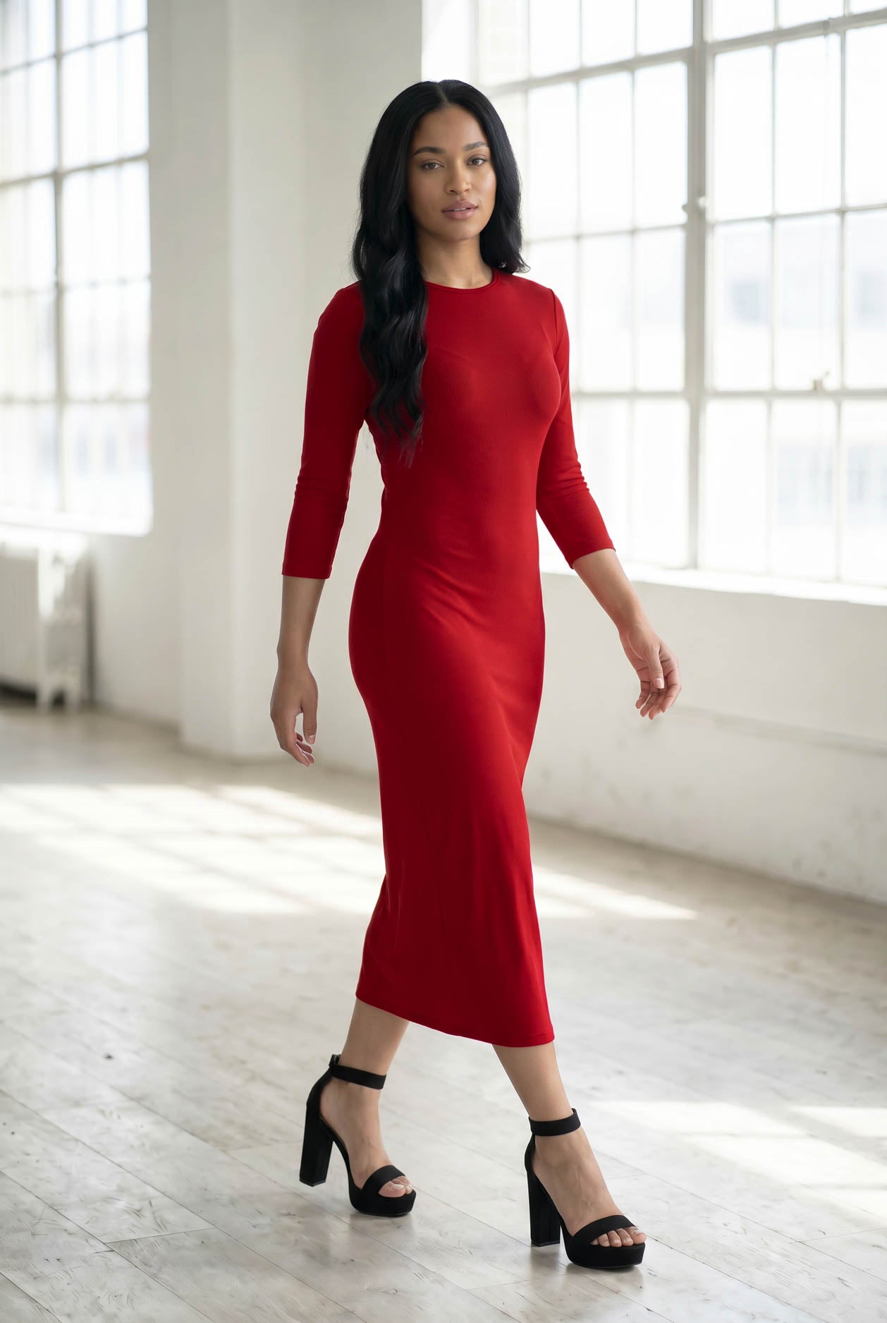 Model wearing Nuggles® Ribbed Layering Dress in Brick Red