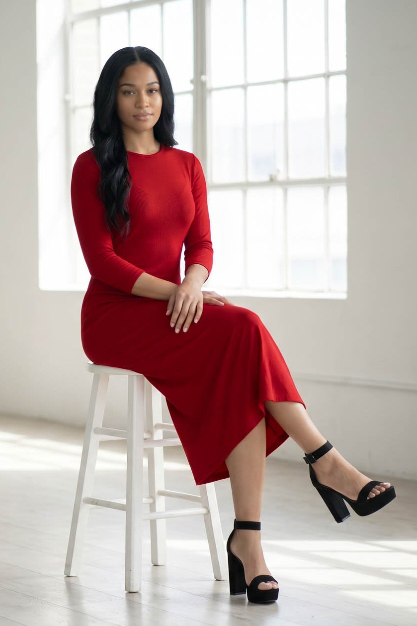 Model wearing Nuggles® Ribbed Layering Dress in Brick Red