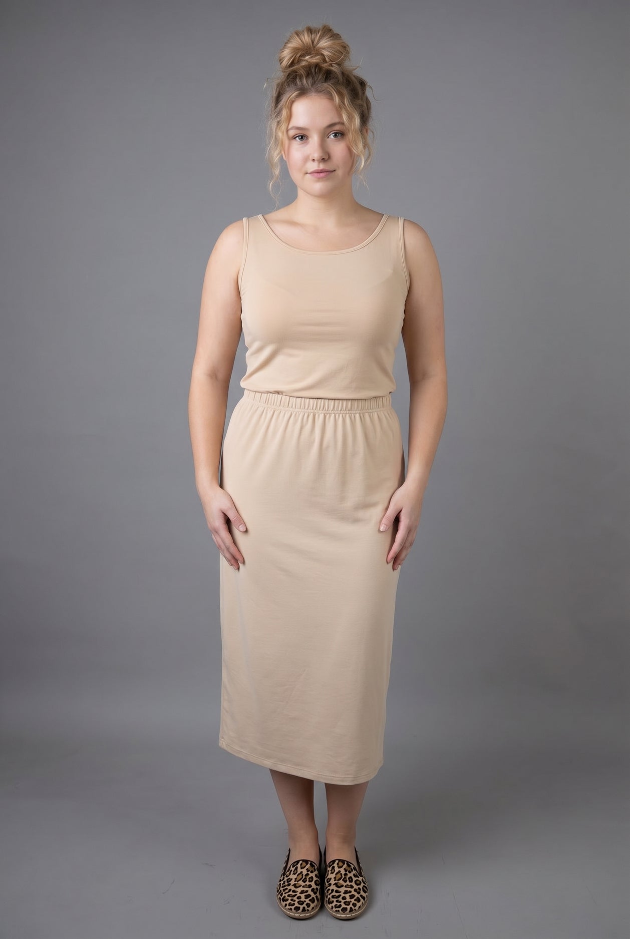 Model wearing Nuggles® Wide Neck Tank in Buff