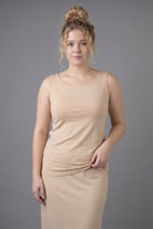 Model wearing Nuggles® Wide Neck Tank in Buff