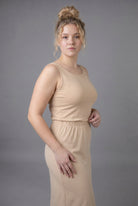 Model wearing Nuggles® Wide Neck Tank in Buff