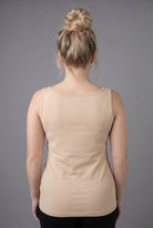 Model wearing Nuggles® Wide Neck Tank in Buff