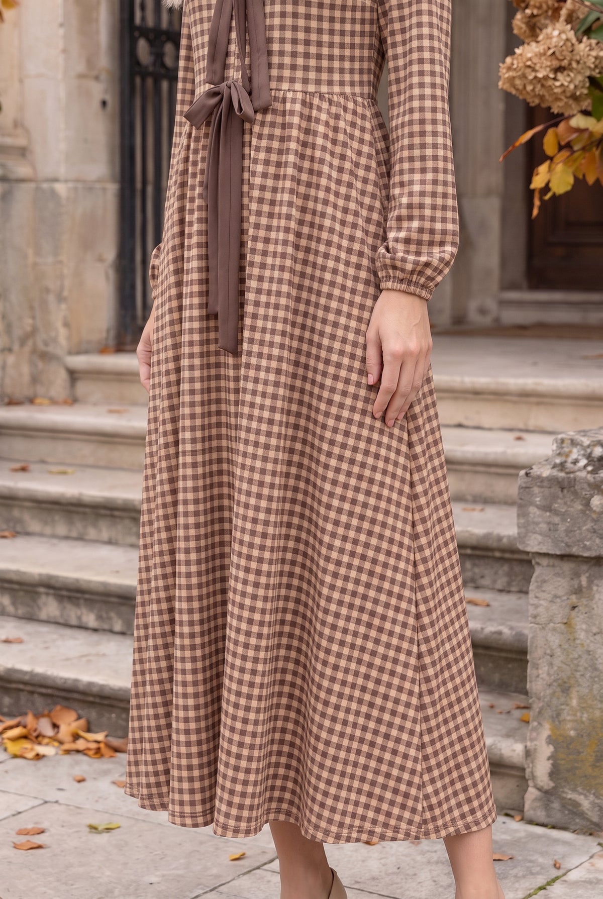 Model wearing Nuggles®  Addison Dress in Buffalo Check