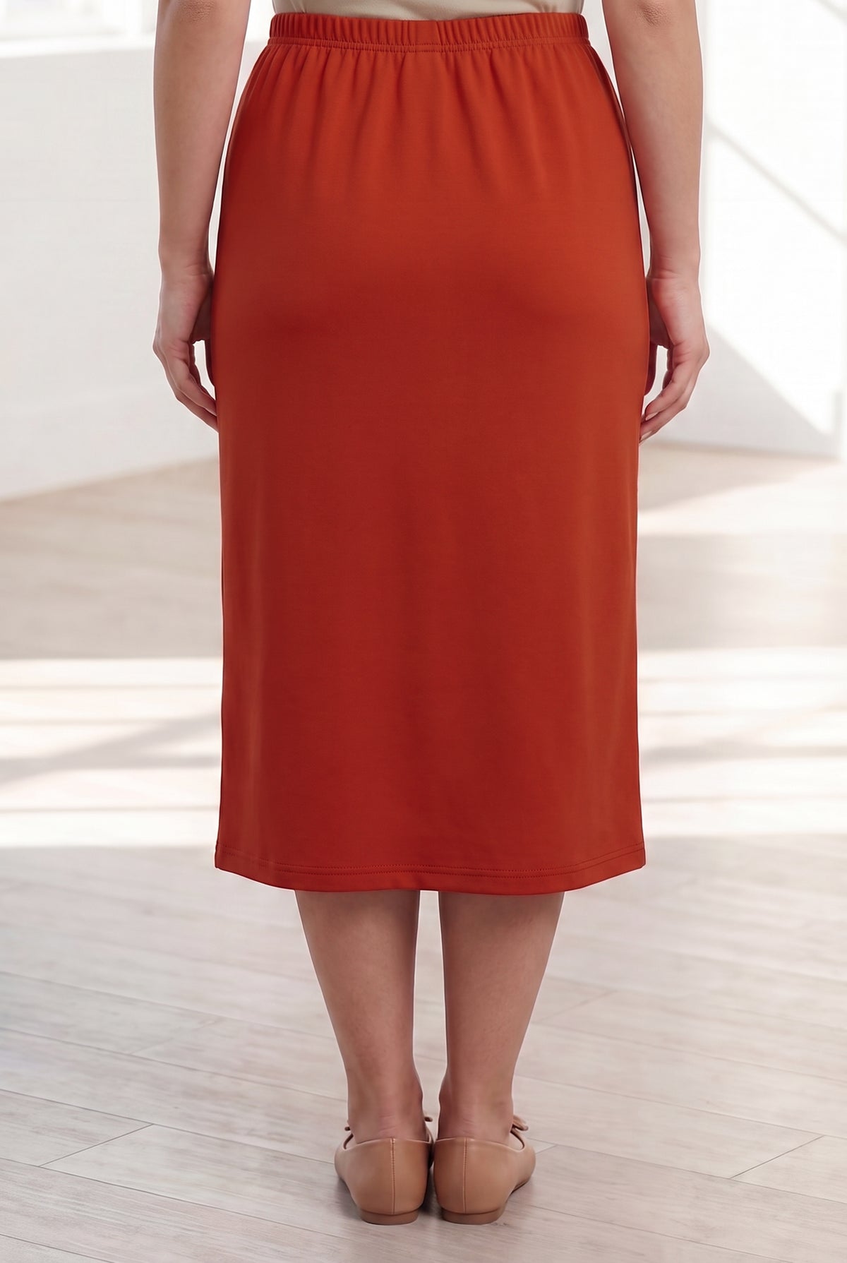 Model wearing Nuggles® 31" Classic Skirt in Burnt Orange