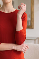 Model wearing Nuggles®  Essential 3/4 Sleeve Tee in Burnt Orange