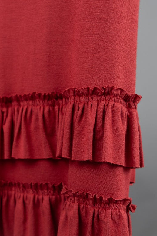 Model wearing Nuggles®  Callie Skirt in Brick Red
