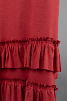 Model wearing Nuggles®  Callie Skirt in Brick Red