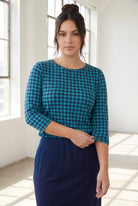 Model wearing Nuggles® 3/4 Essential Tee in Calm Check