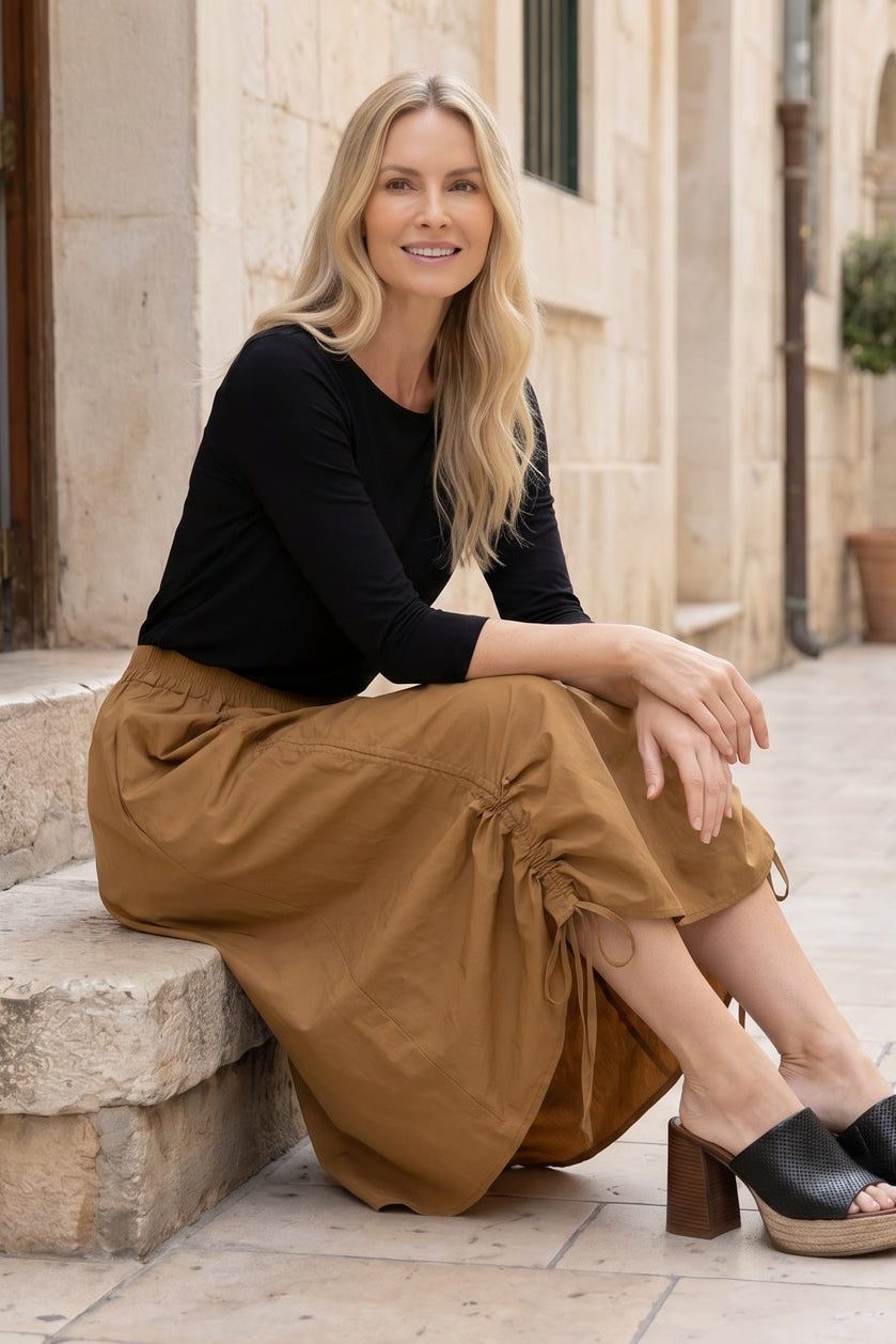 Model wearing Nuggles® Oriana Skirt in Camel