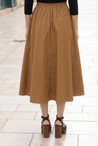 Model wearing Nuggles® Oriana Skirt in Camel