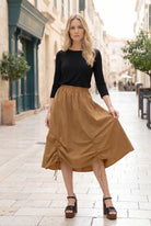 Model wearing Nuggles® Oriana Skirt in Camel