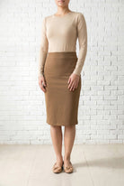 Model wearing Nuggles® 25" Relaxed Skirt in Camel