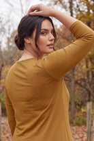 Model wearing Nuggles®  Essential 3/4 Sleeve Tee in Camel