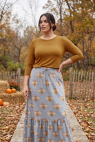Model wearing Nuggles®  Essential 3/4 Sleeve Tee in Camel