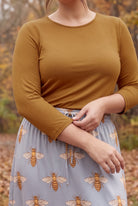Model wearing Nuggles®  Essential 3/4 Sleeve Tee in Camel