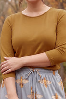 Model wearing Nuggles®  Essential 3/4 Sleeve Tee in Camel
