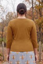 Model wearing Nuggles®  Essential 3/4 Sleeve Tee in Camel
