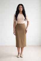 Model wearing Nuggles® 31" Relaxed Skirt in Camel