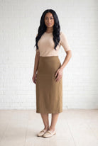 Model wearing Nuggles® 31" Relaxed Skirt in Camel