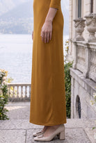 Model wearing Nuggles® Maxi Layering  Dress in Camel