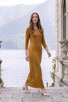Model wearing Nuggles® Maxi Layering  Dress in Camel