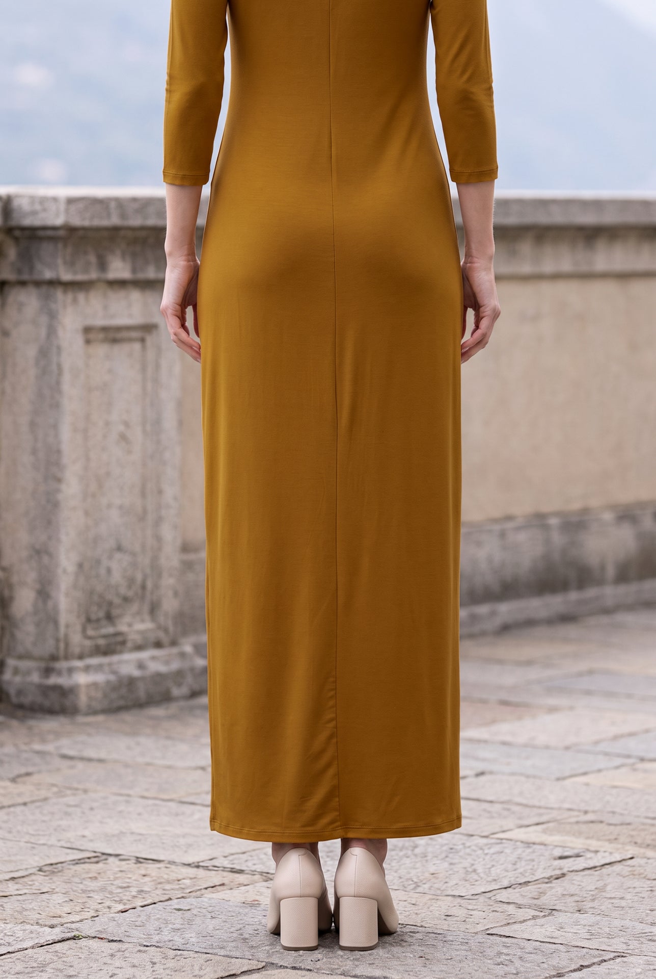 Model wearing Nuggles® Maxi Layering  Dress in Camel