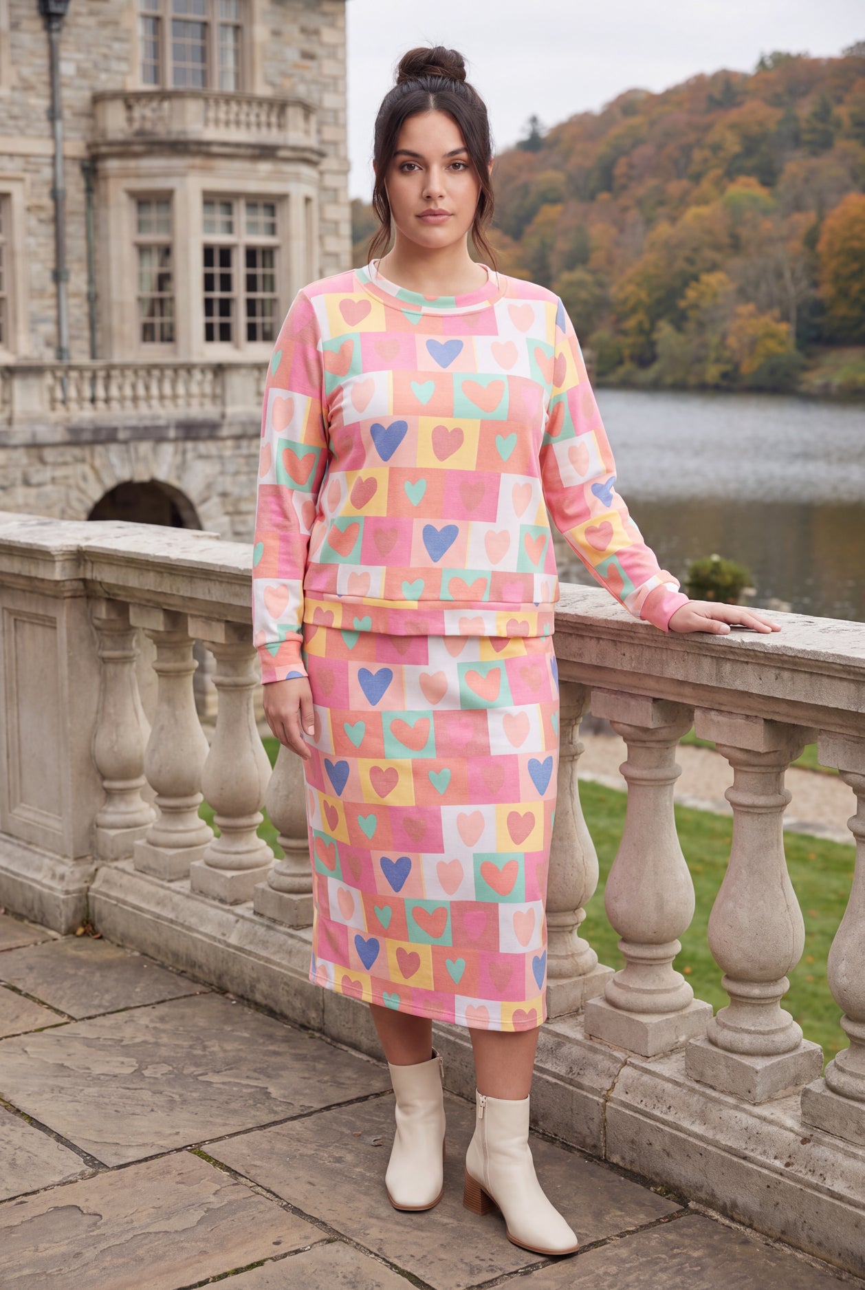 Model wearing Nuggles®  Iris Sweater Skirt in Candy Hearts
