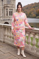 Model wearing Nuggles®  Iris Sweater Skirt in Candy Hearts
