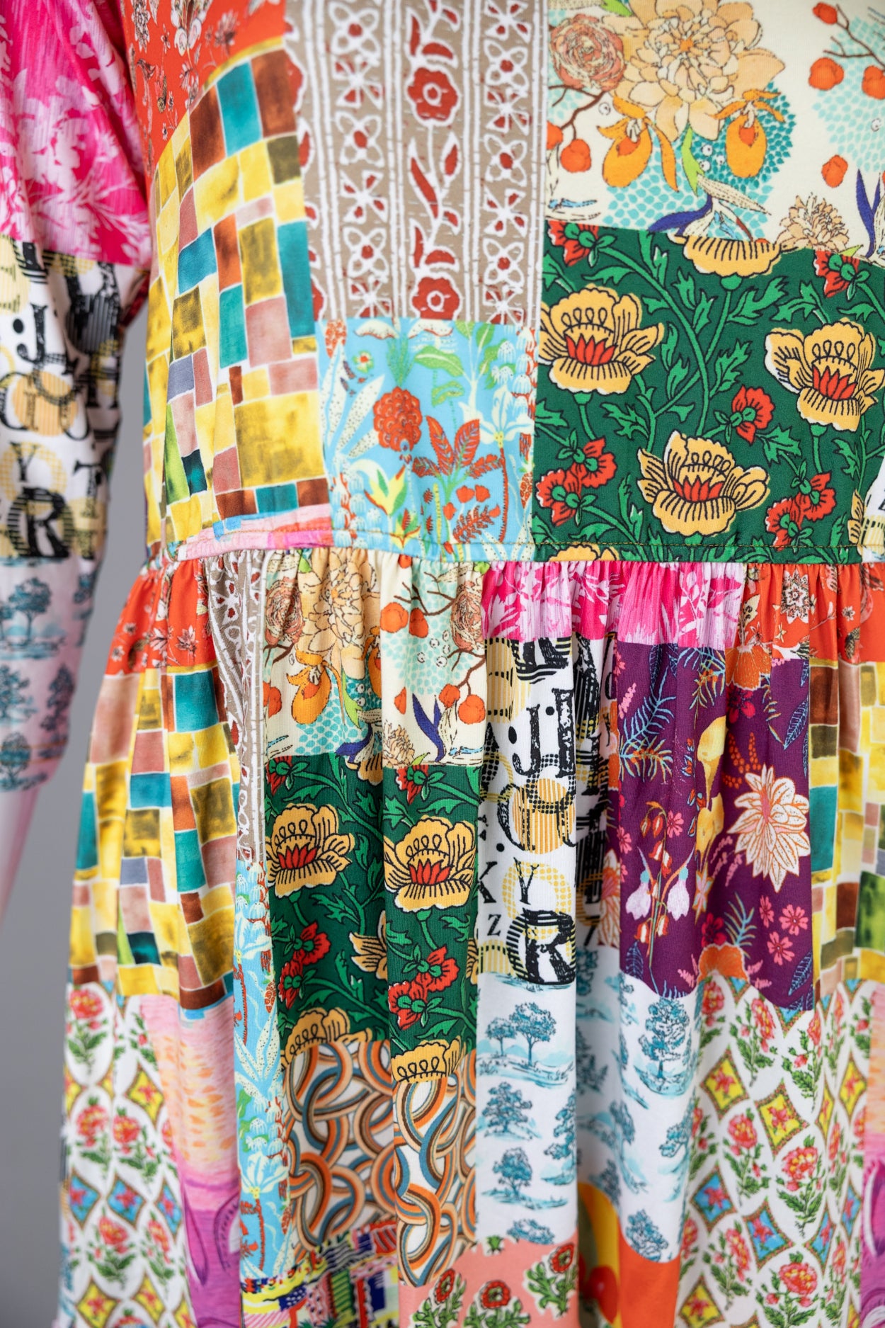 Nuggles Nova Midi Dress in Carousel, cheerful multicolor-print modest cotton dress for everyday wear