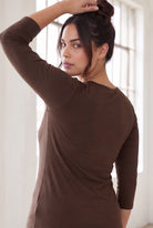 Model wearing Nuggles®  Essential  3/4 Tee in Chocolate Brown