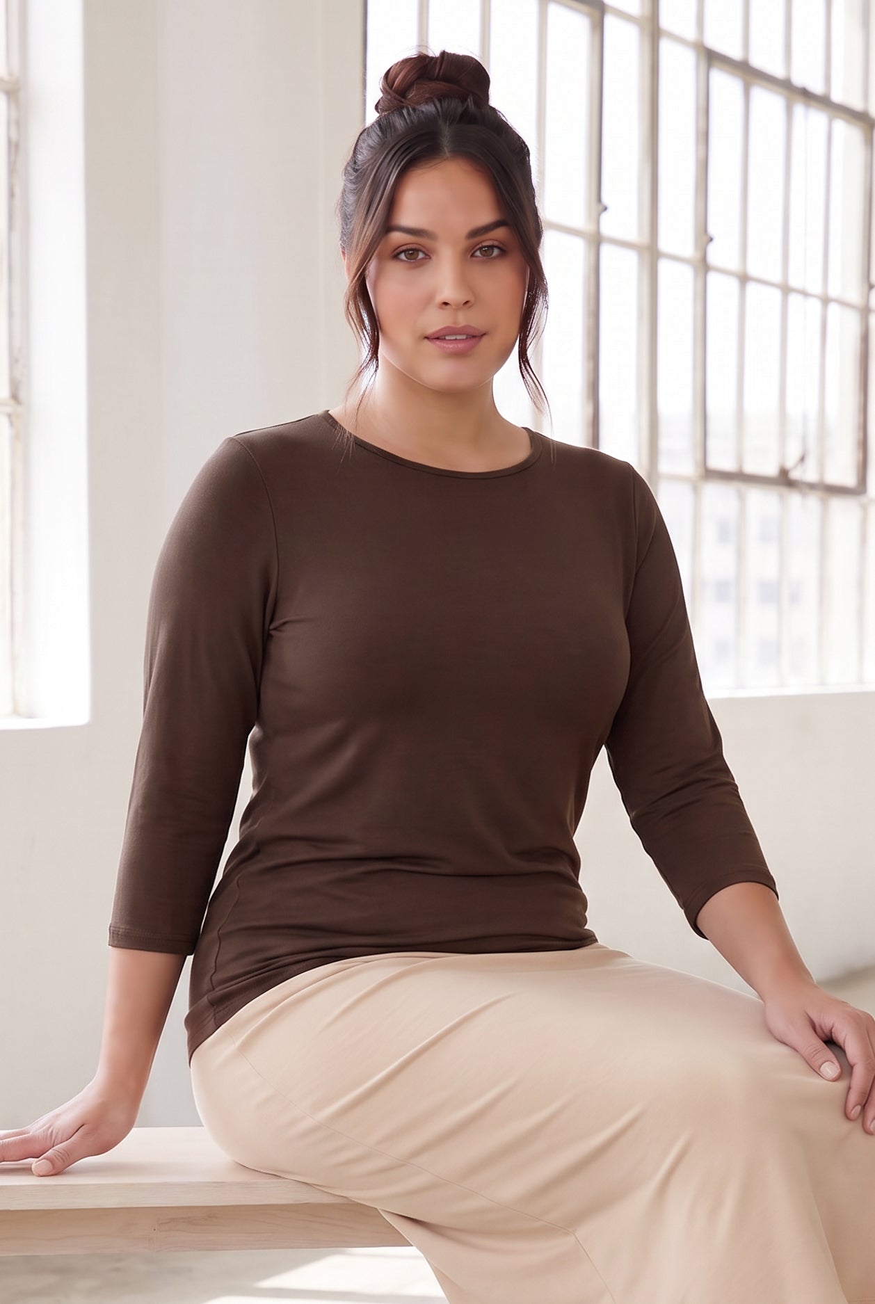 Model wearing Nuggles®  Essential  3/4 Tee in Chocolate Brown