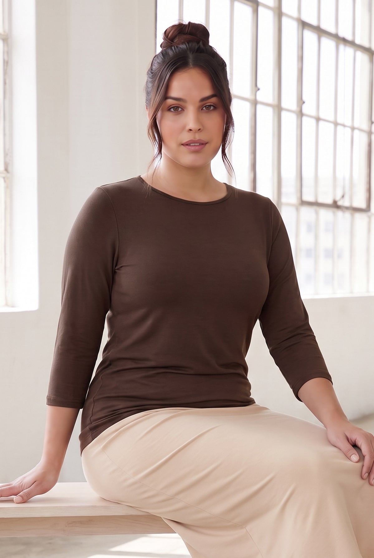 Model wearing Nuggles®  Essential  3/4 Tee in Chocolate Brown