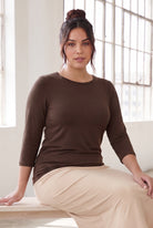 Model wearing Nuggles®  Essential  3/4 Tee in Chocolate Brown