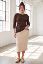 Model wearing Nuggles®  Essential  3/4 Tee in Chocolate Brown