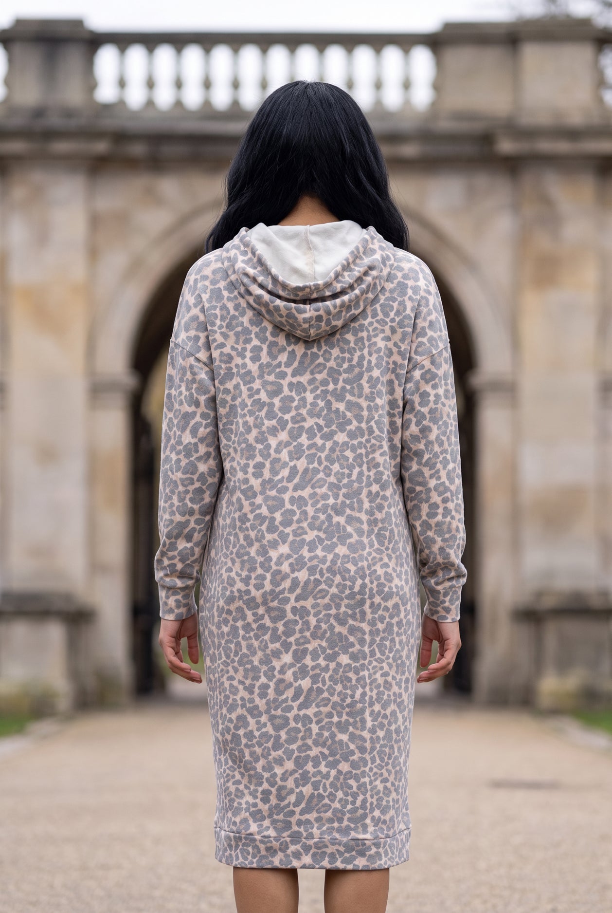 Nuggles® Hoodie Dress in Classic Leopard, full-length back view, hood down over its cream lining